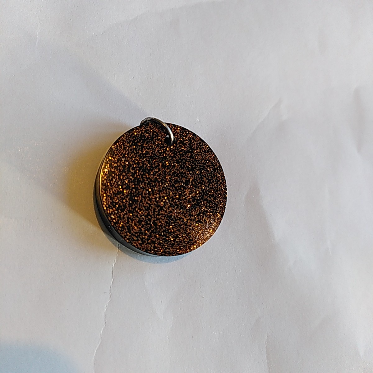 Pendentif rond couleur bronze alignement